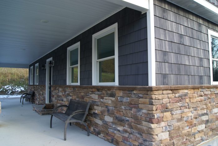 How much to replace vinyl siding with brick